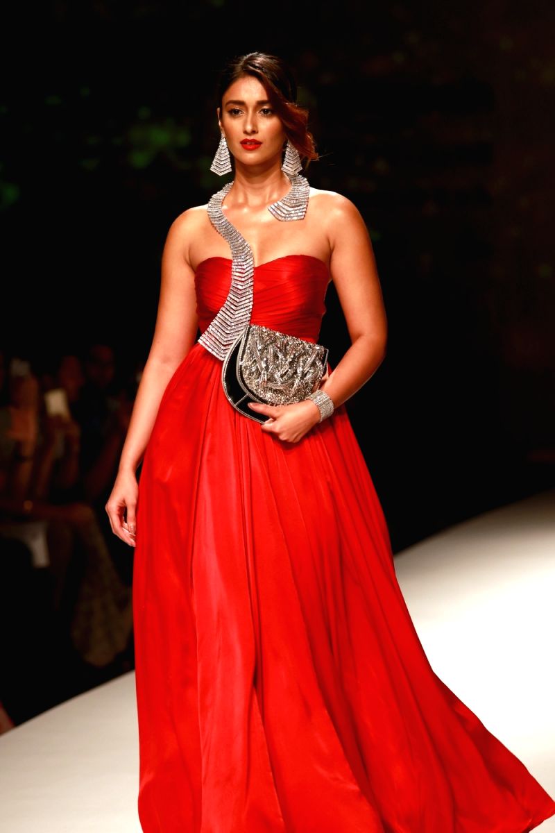 Ileana is a sight for sore eyes in this red gown