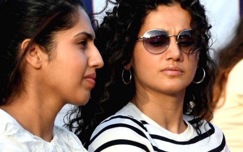 : Mumbai: Bollywood actress Taapsee Pannu along with sister Shagun Pannu watch the bollywood all star football match