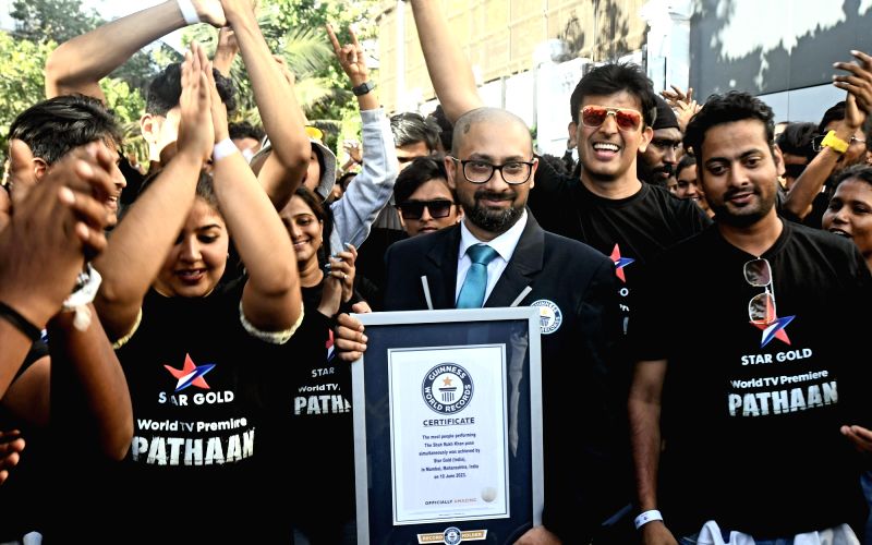 :Mumbai: Fans celebrate outside Shahrukh Khan residence as they make a Guinness World Record