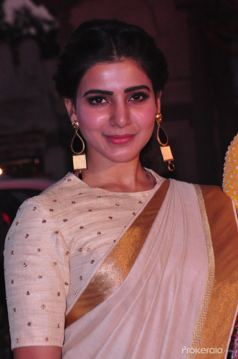 Samantha looks like a doll in this white and gold saree
