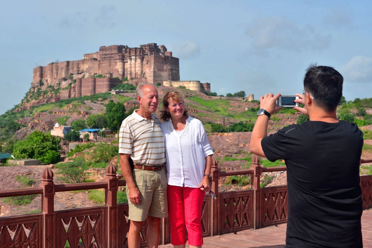 Tourists click pictures in front of Mehrangarh Fort in Jodhpur